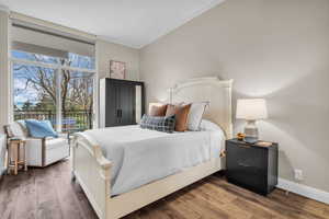 Slider to the patio and high ceilings make this bedroom comfortable and peaceful