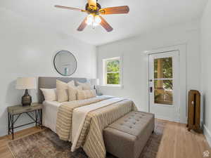 Bedroom featuring light wood-type flooring and ceiling fan