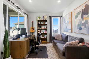 Home office featuring plenty of natural light and recessed lighting