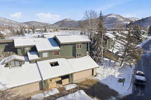 Snowy aerial view with a mountain view