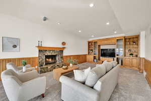 Expansive family room with custom cabinetry and gas fireplace.