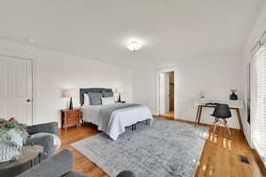 Main level guest suite with private balcony and entrance.