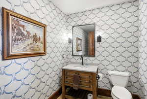 Bathroom featuring toilet and vanity