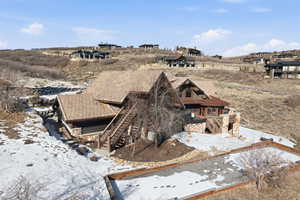 Snowy aerial view featuring a residential view