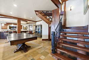 Rec room featuring recessed lighting and arched walkways