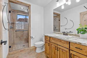2nd Floor – Bedroom #4 Full Bathroom with Walk-In Shower. Bathroom featuring vanity and a shower stall