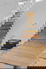 Stairway to Upper Floor. Staircase featuring recessed lighting