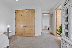 Bedroom #2 – En-Suite Full Bathroom. Bedroom featuring carpet floors and a closet