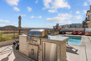 BBQ and pool with view of Coral Canyon Golf Course