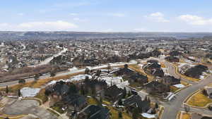 View of property location with nearby suburban area