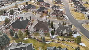 Aerial overview of property's location with nearby suburban area
