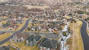 Aerial view of property's location featuring nearby suburban area