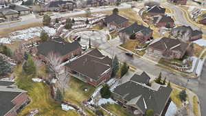 Aerial view of property's location featuring nearby suburban area