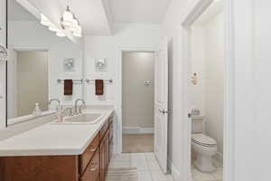 Bathroom featuring vanity and light tile patterned floors