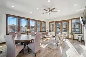 Dining area with recessed lighting and ceiling fan
