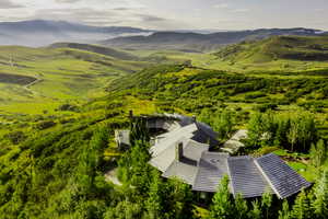 Drone / aerial view of a mountain backdrop