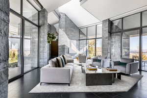 Community lobby featuring expansive windows and high vaulted ceiling