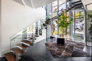 Stairs with a wall of windows