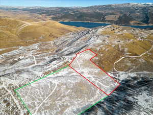 View of property location featuring property boundaries highlighted and a water and mountain view