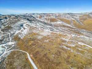 Snowy aerial view with a mountain view