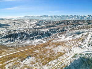 Snowy aerial view with a mountain view