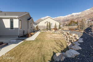 Fenced yard with a mountain view