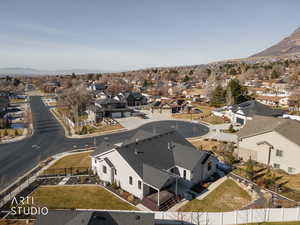 Aerial view of residential area featuring mountains