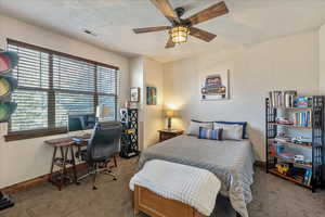 Upstairs bedroom featuring a bright, inviting layout with ample space and comfort