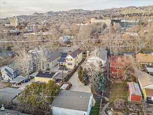Aerial view of residential area with a mountain backdrop