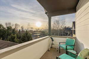 View of balconPrivate second-story balcony offering breathtaking panoramic views and an elevated outdoor retreat for relaxing mornings and stunning sunsets.y