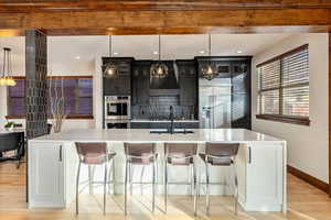 An expansive central island, designed as a stunning focal point with generous workspace and effortless entertaining appeal.