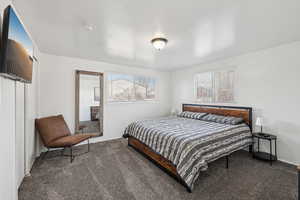 Bedroom featuring carpet