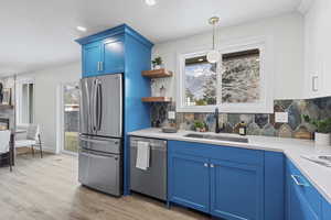 Custom Designer European Kitchen with Built-In Gas Range, Microwave, and Oven. Counter-depth state-of-the-art Refridgerator.