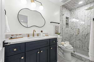 Downstairs Bathroom featuring Frameless Euro Glass Shower