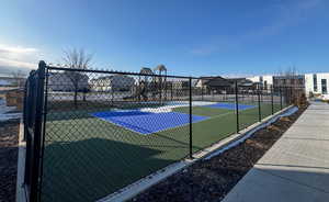 View of basketball court with a tennis court