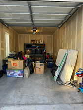 Garage featuring a garage door opener