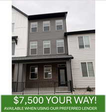 View of front of property with brick siding, board and batten siding, and a porch
