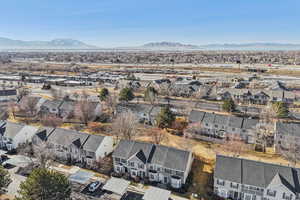 Aerial perspective of suburban area featuring mountains