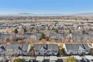 Aerial view of residential area featuring mountains