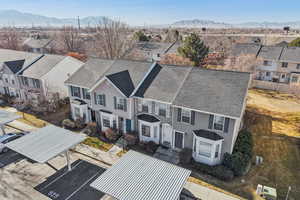 Aerial perspective of suburban area with mountains