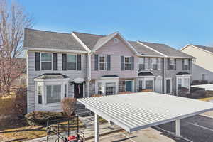 Colonial house with roof with shingles
