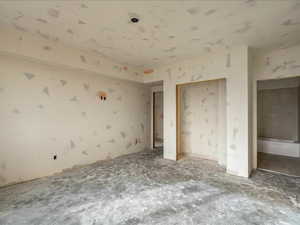 Unfurnished bedroom featuring a closet
