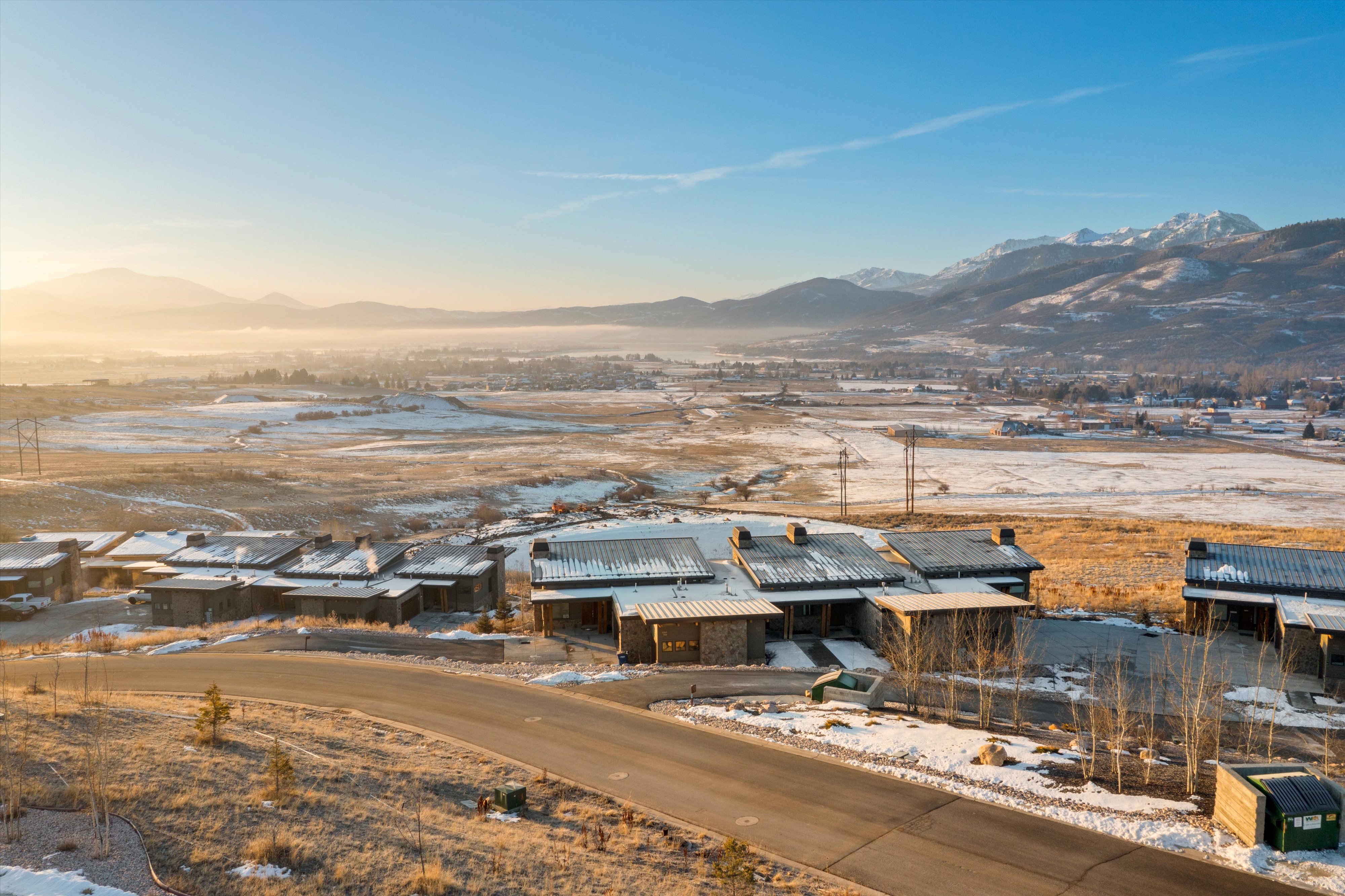 View of mountain backdrop with nearby suburban area