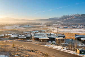 View of mountain backdrop with nearby suburban area