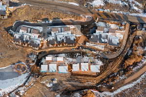 Snowy aerial view with a residential view