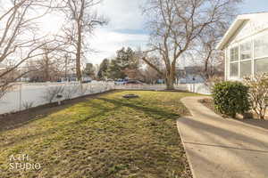 View of fenced backyard