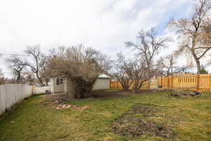 View of fenced backyard