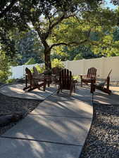 Fenced backyard featuring a patio area