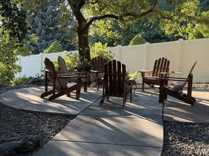 Fenced backyard featuring a patio area