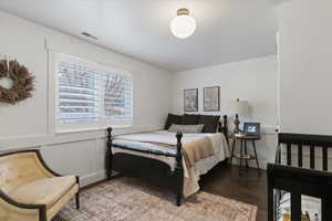 Bedroom with wood finished floors